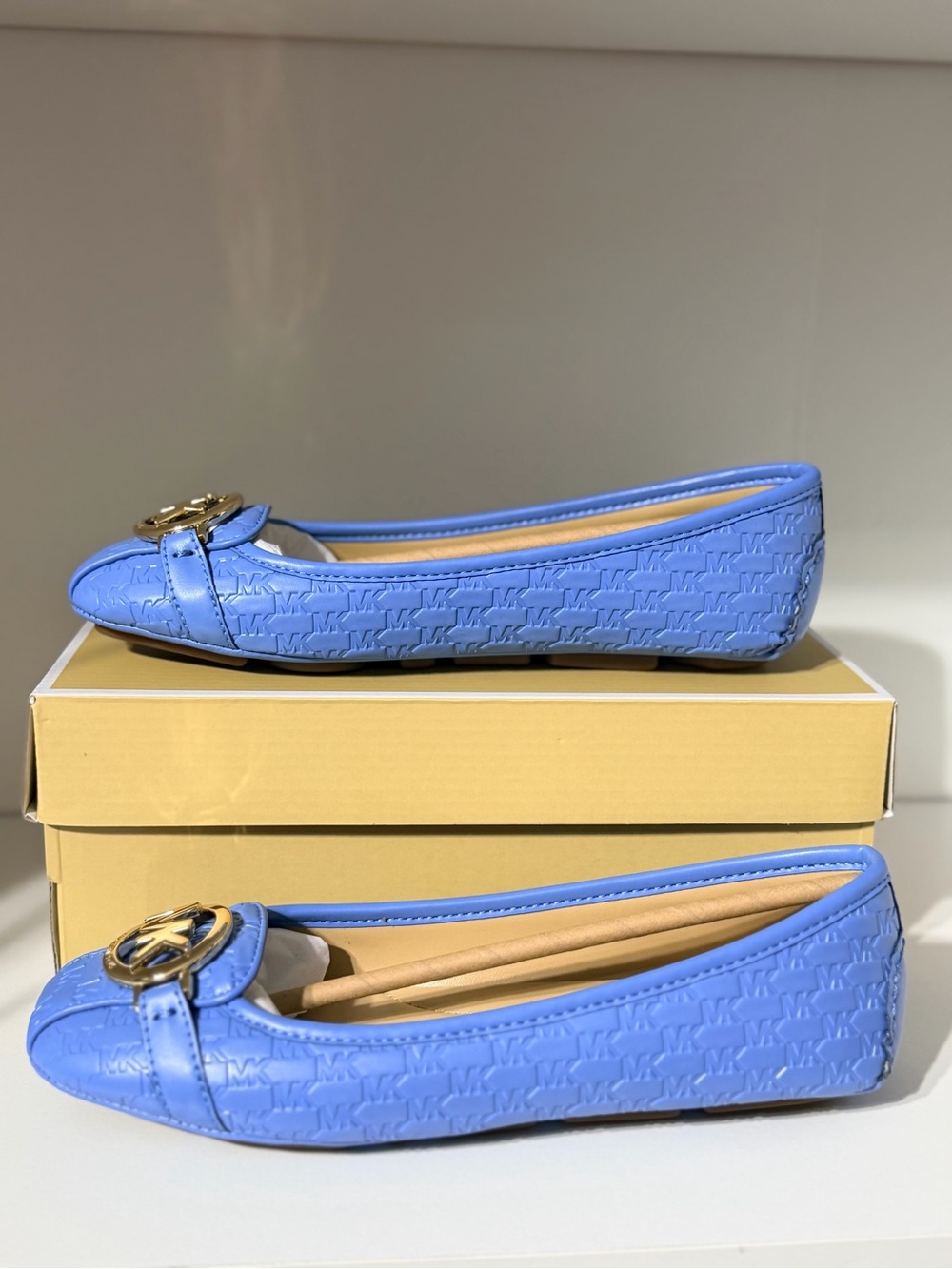 Michael Kors Fulton Logo-Embossed Flats with Gold Hardware
